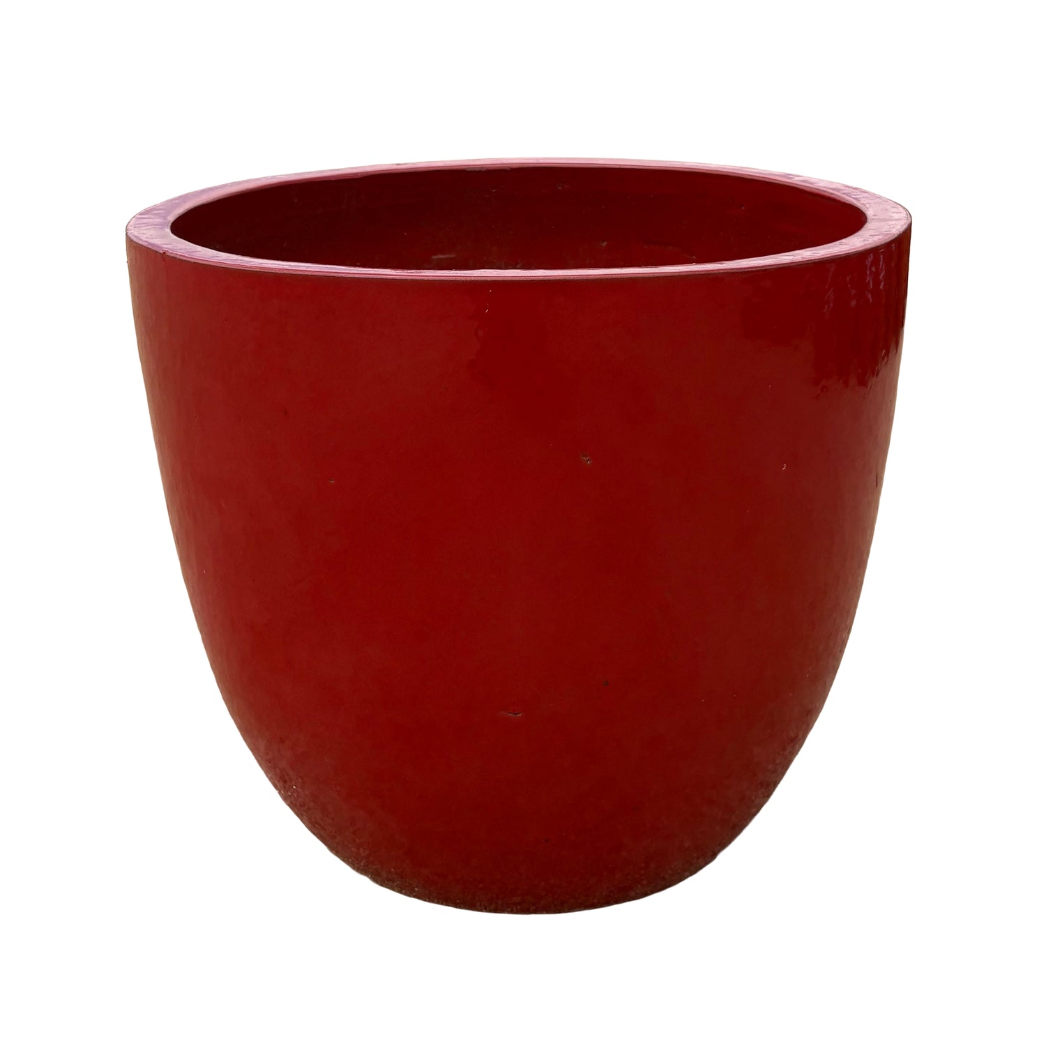 Bright red tapered round ceramic planter featuring a smooth tapered silhouette and vibrant red glaze.