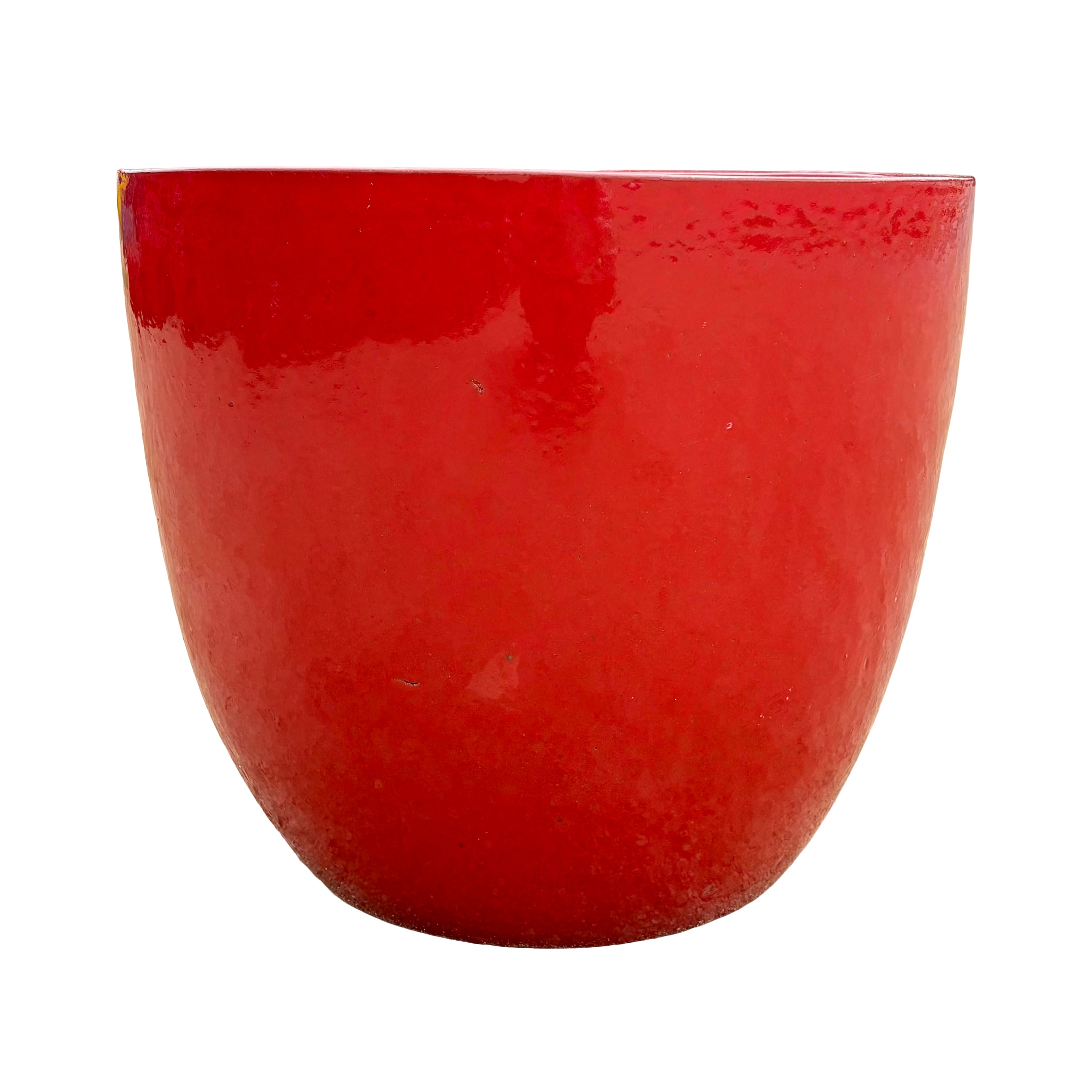 Bright red tapered round ceramic planter highlighting its tapered profile and striking glazed finish.