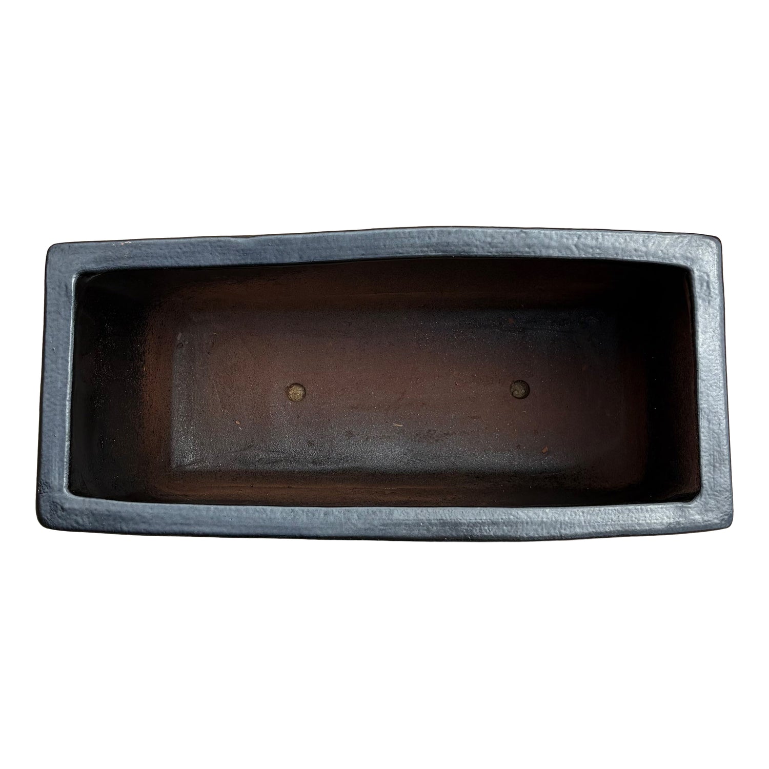 Top view of the matte black glazed rectangular ceramic planter showing the elongated planting space and smooth interior finish.