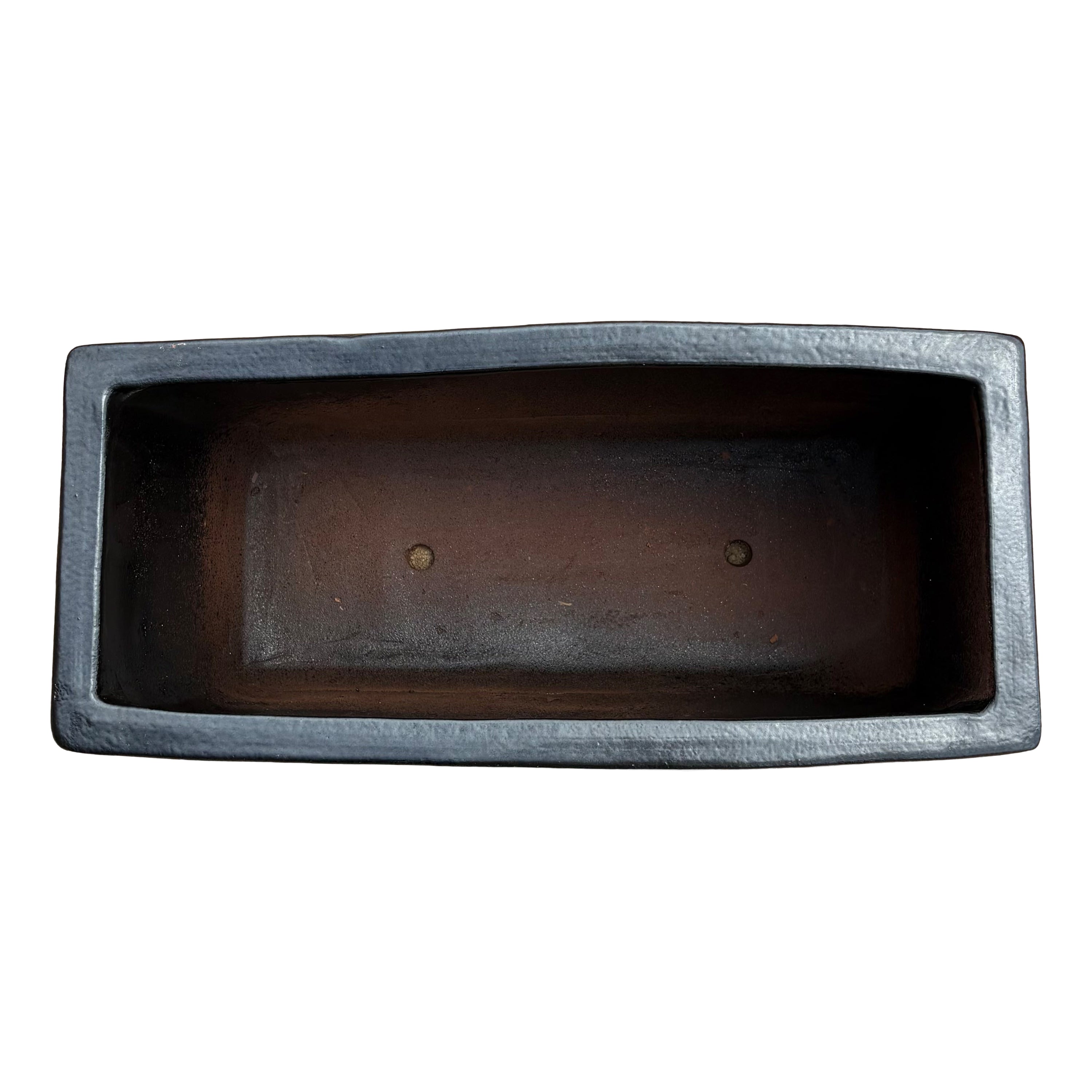 Top view of the matte black glazed rectangular ceramic planter showing the elongated planting space and smooth interior finish.