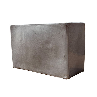 White glazed rectangular ceramic planter shown from the side, highlighting its minimalist rectangular profile and smooth finish.