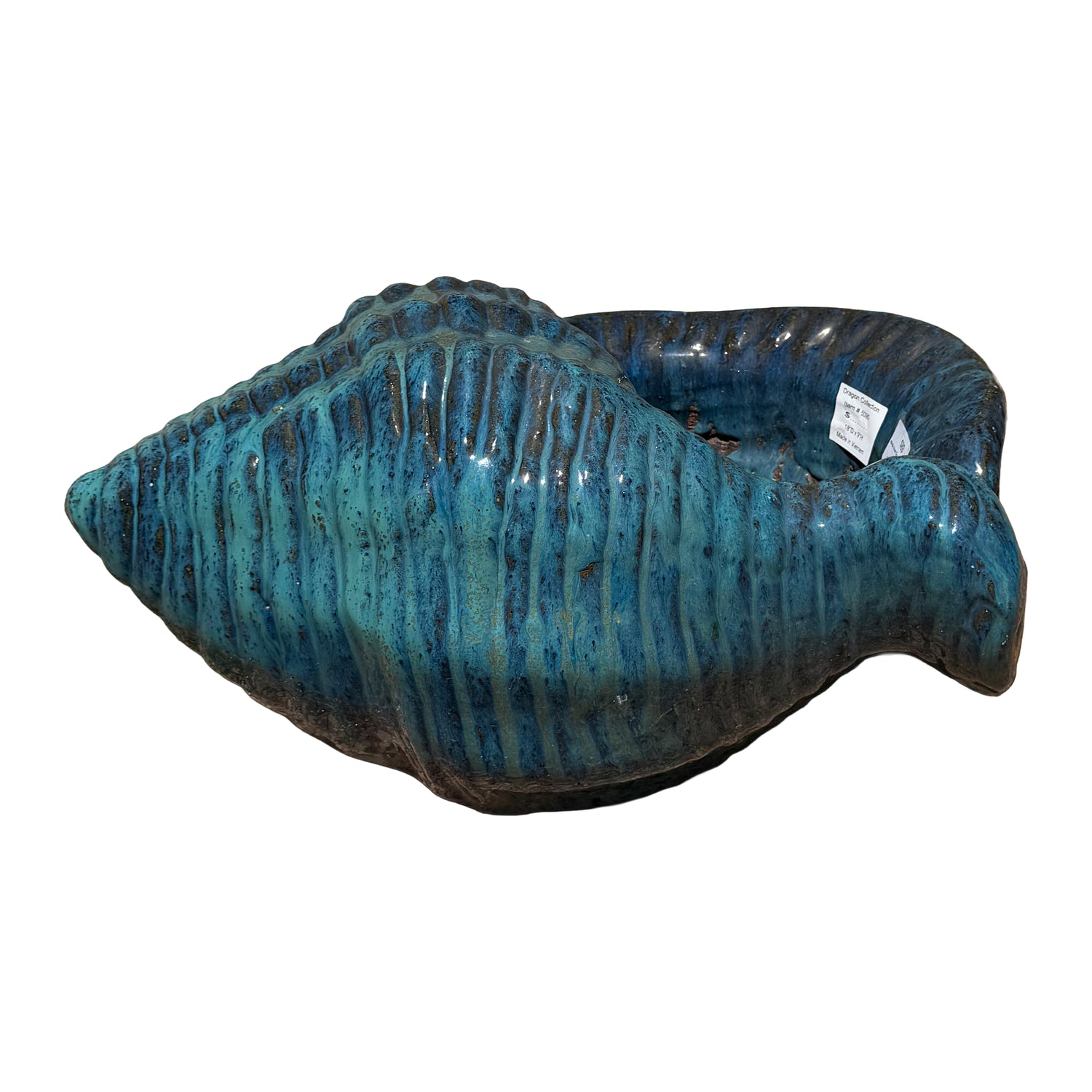 Side view of Marble Green ceramic conch planter displaying the curved conch silhouette and ceramic craftsmanship