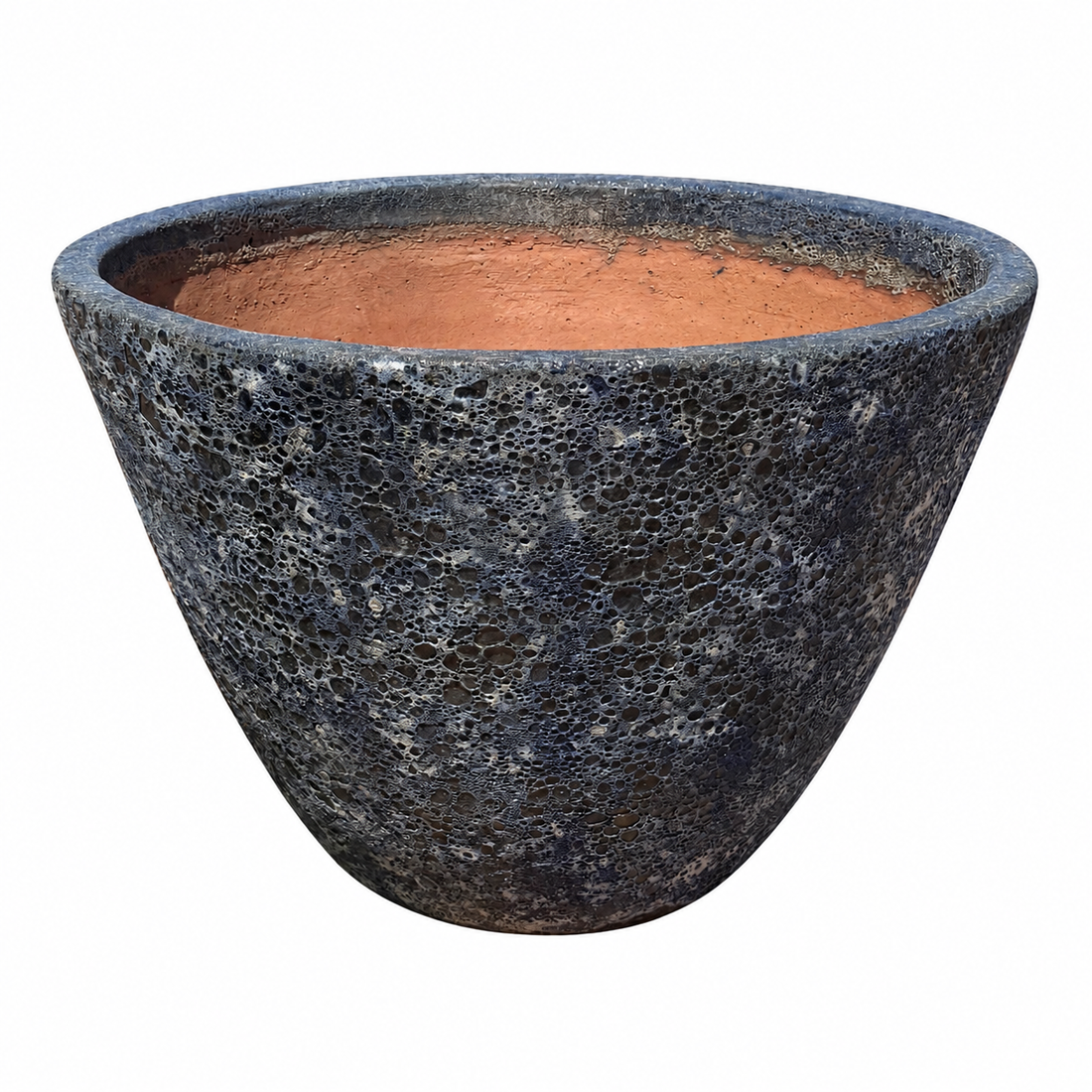 A large conical planter pot with a textured, porous dark blue exterior and a warm terracotta-colored interior, shown against a plain white background.