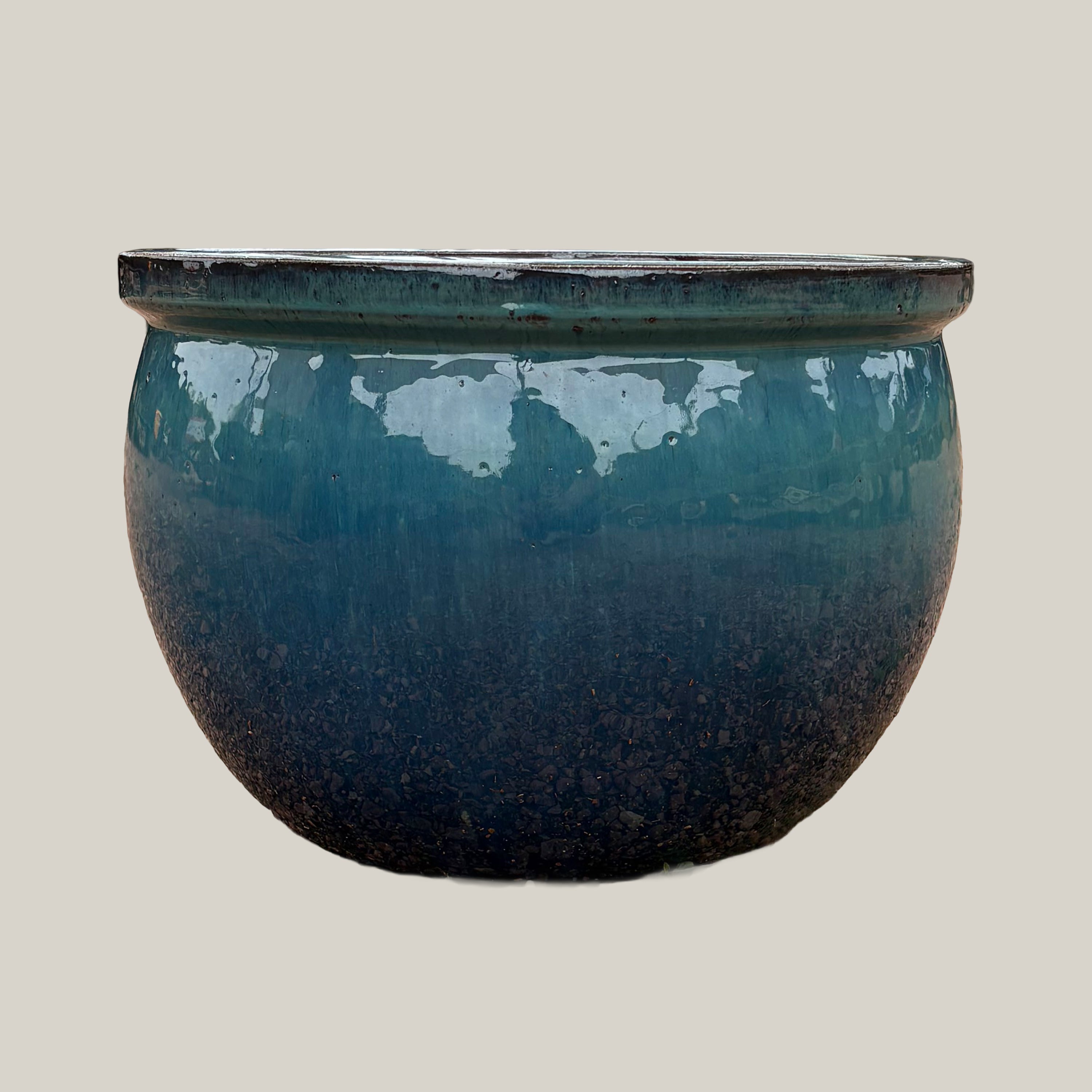 Front view of turquoise round bowl planter with clean, classic bowl silhouette and smooth glossy finish