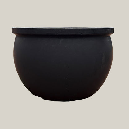 Front view of matte black round bowl planter with clean, modern bowl shape and understated matte surface