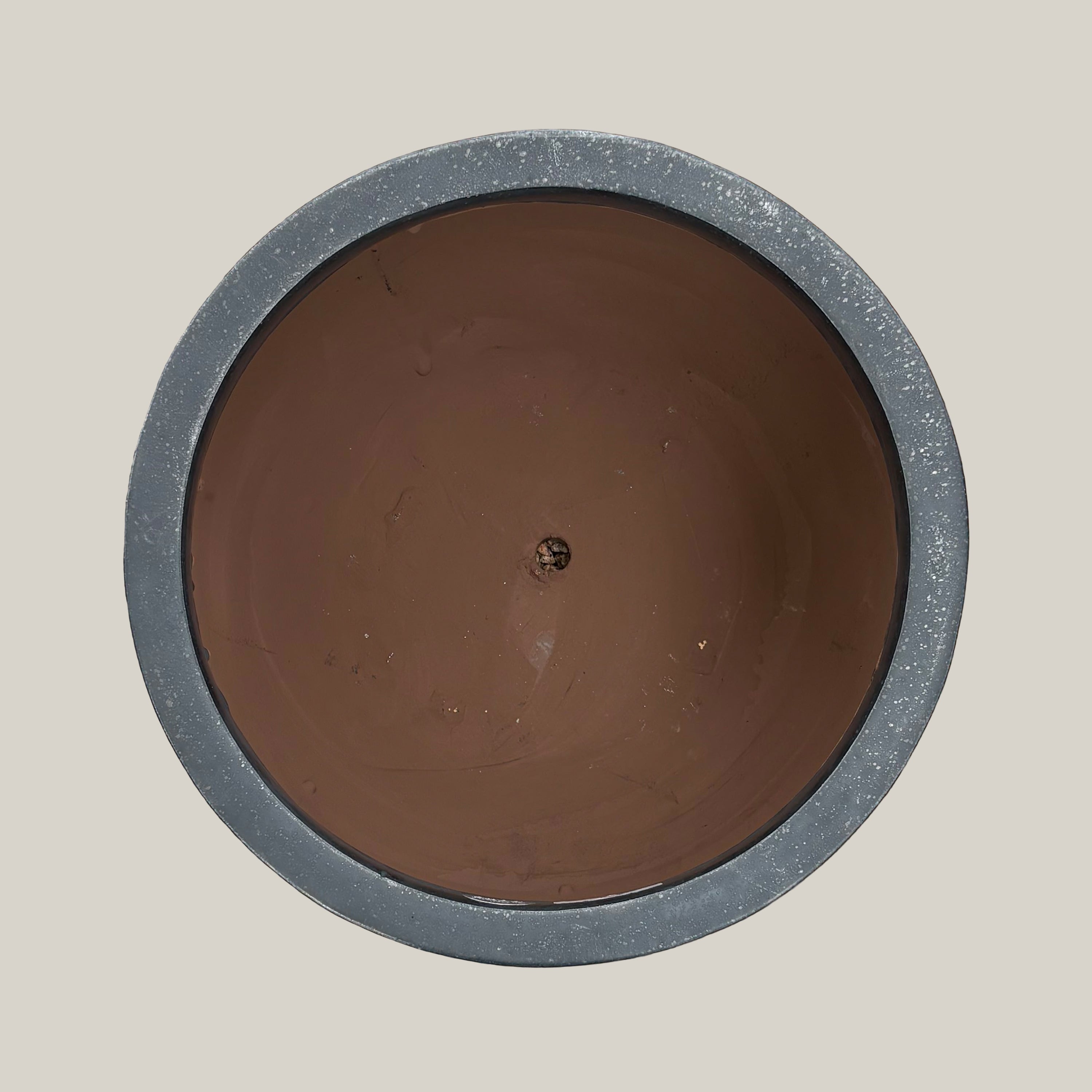 Top view of matte black round bowl planter showing wide circular opening and minimal interior design
