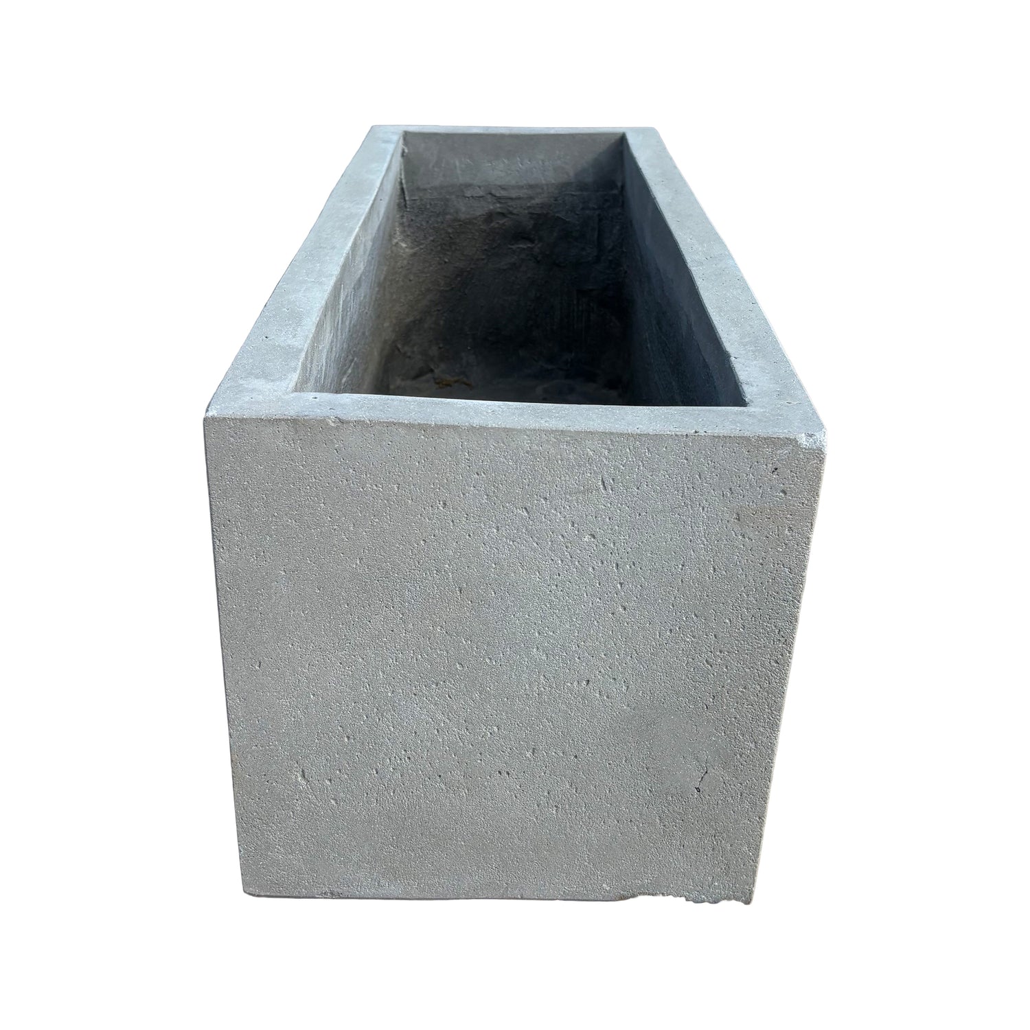 Top-down view of low grey rectangular fiberstone planter, emphasizing its rectangular opening and compact, streamlined proportions.