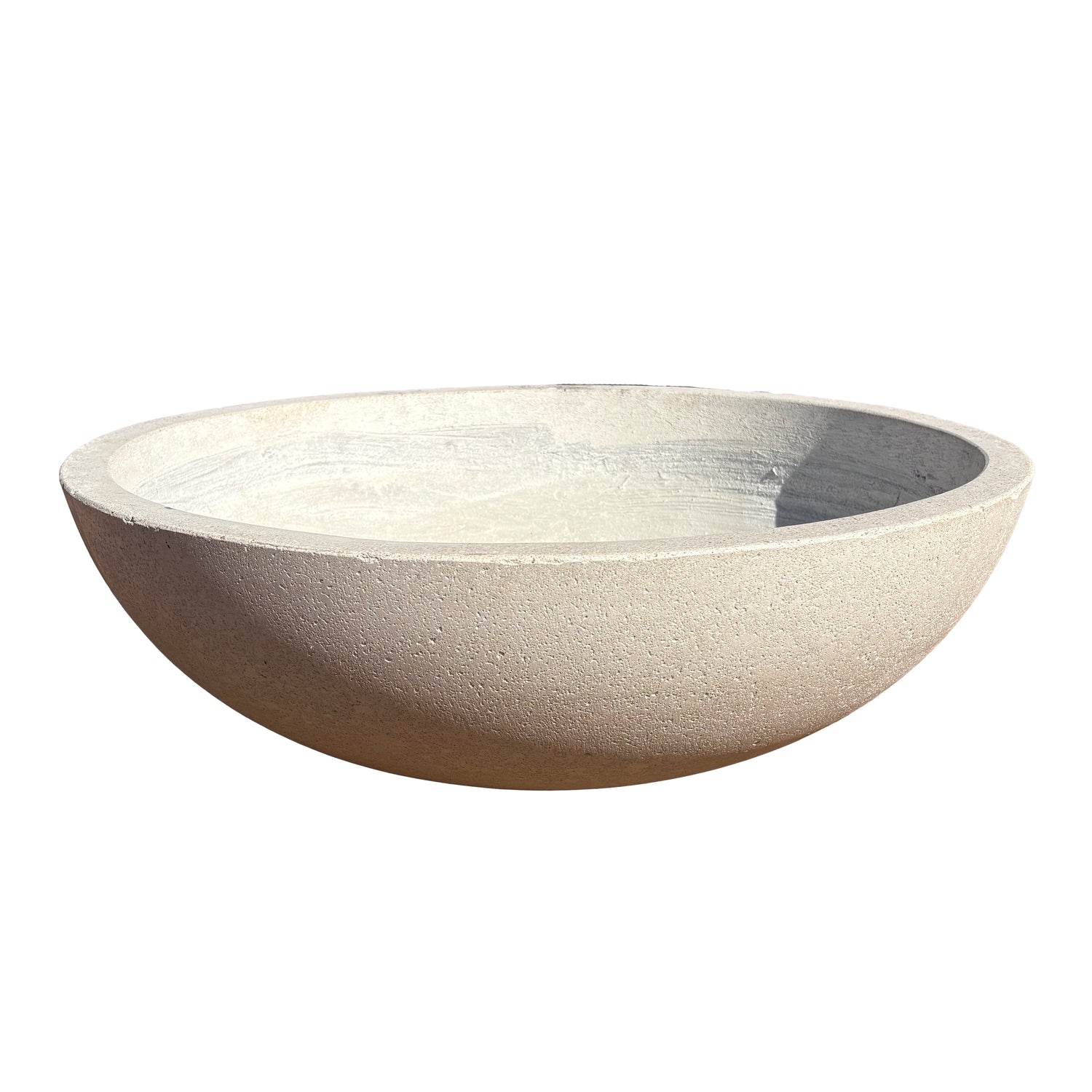 White low bowl fiberstone planter viewed from the front with a slight angle, emphasizing its low, rounded form and natural stone-look texture.