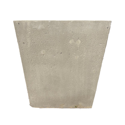 Front-facing view of grey tapered square fiberstone planter, showcasing its structured shape and smooth, modern surface.
