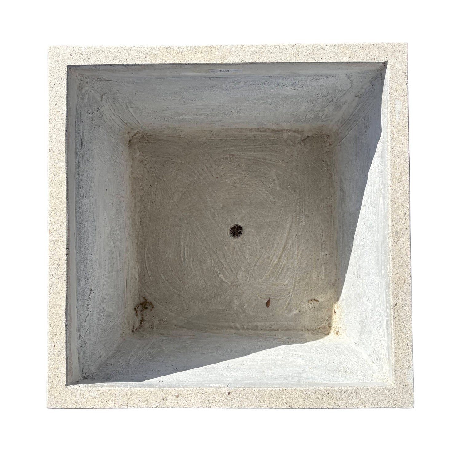 Top-down view of grey cube fiberstone planter, emphasizing its square opening and symmetrical proportions.