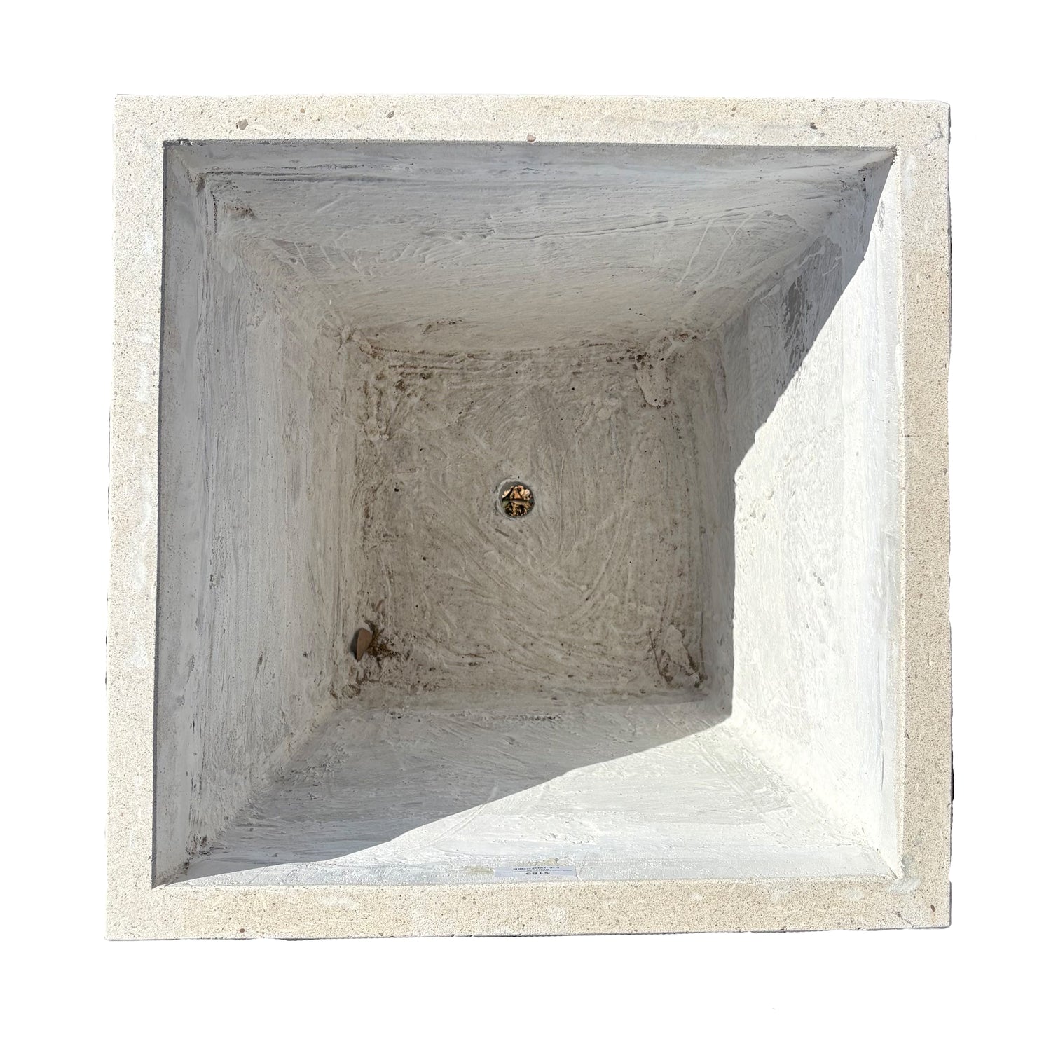 Top-down view of white tapered square fiberstone planter, emphasizing its square opening and balanced proportions.