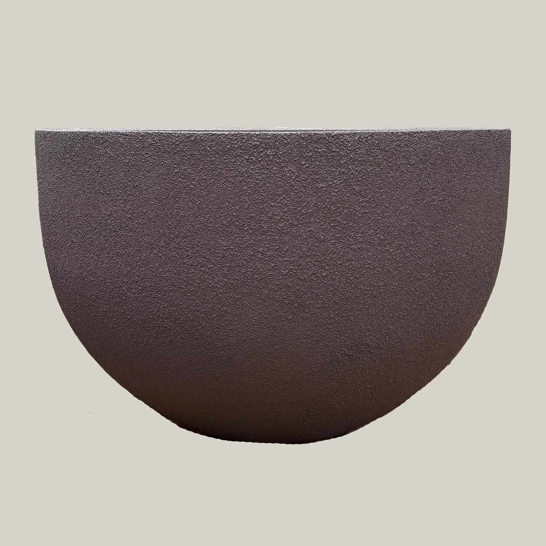 Front view of brown large poly pot with clean modern profile and smooth rounded silhouette in earthy brown tone