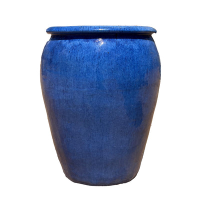 Front view of large round blue ceramic jar planter with rounded profile and rich blue glazed finish