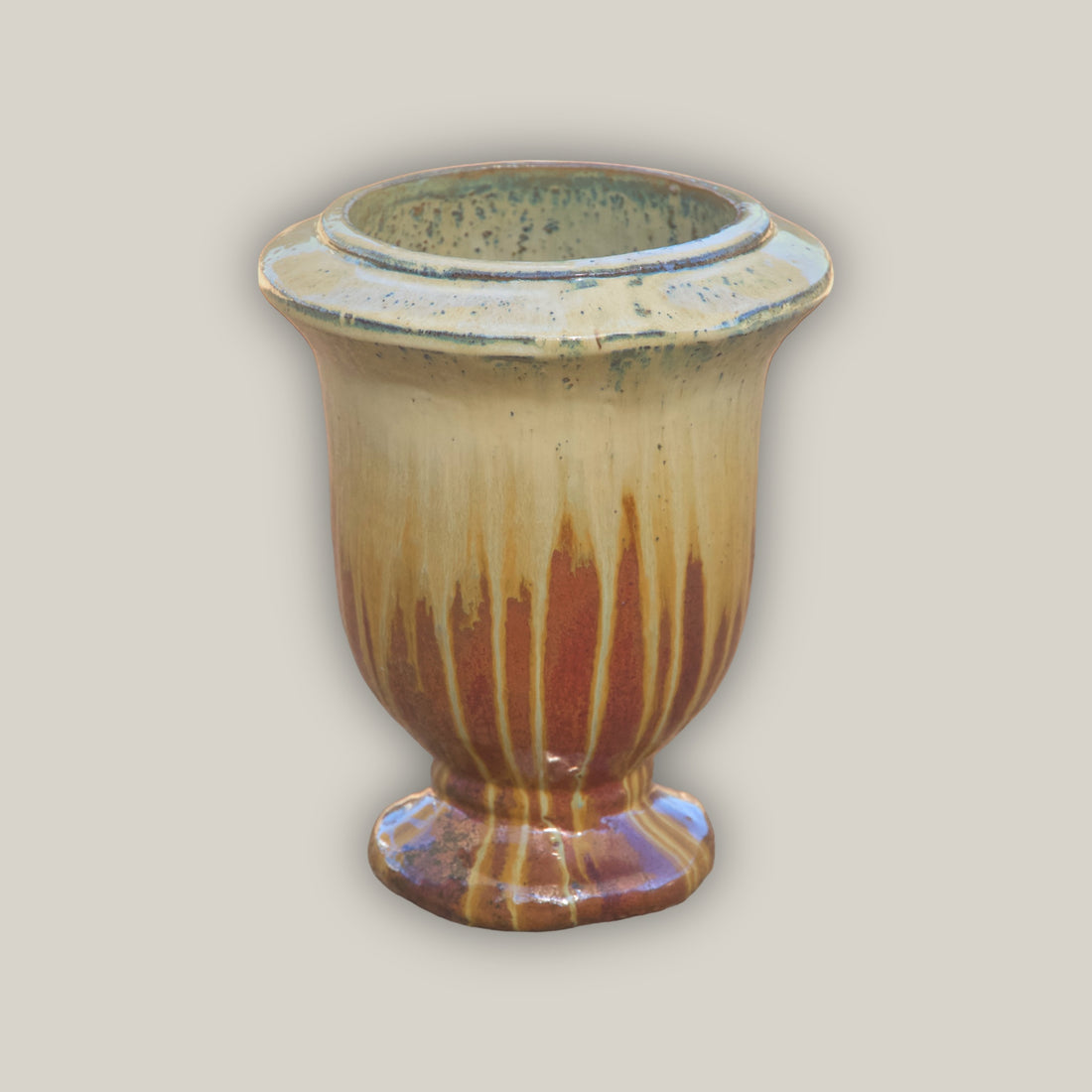 Copper urn planter with cream dripping effect
