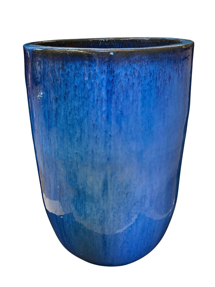 Image of a blue modern cylinder planter.