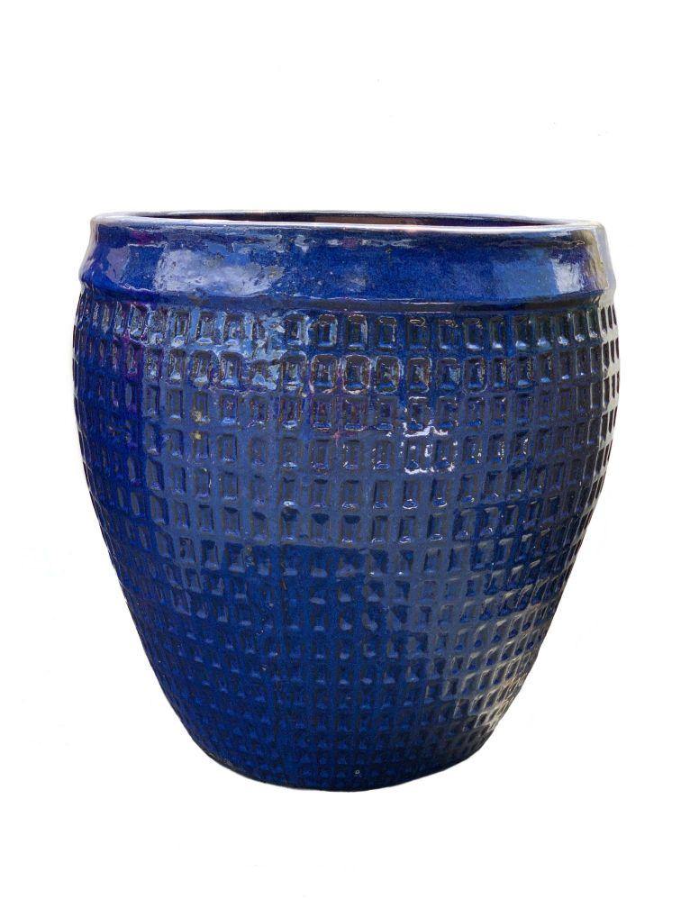 Large blue ceramic planter with wide rim and waffle design
