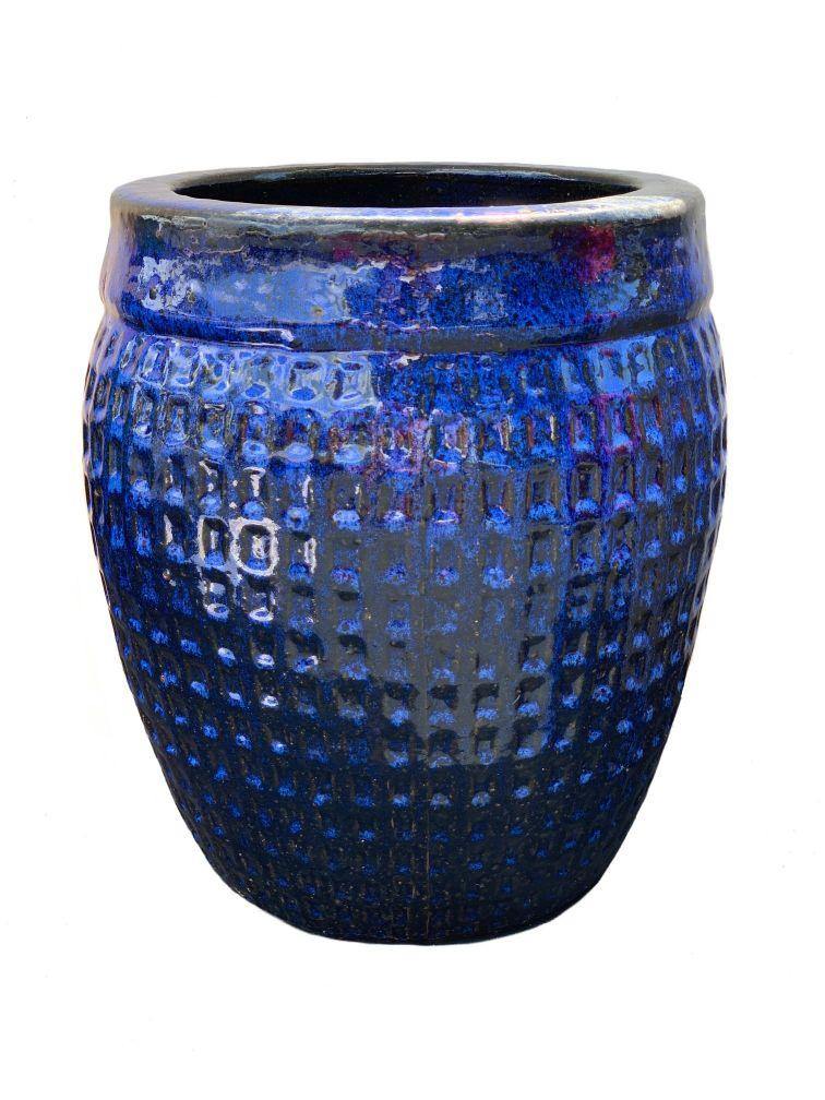 Large blue ceramic planter with wide rim and waffle design