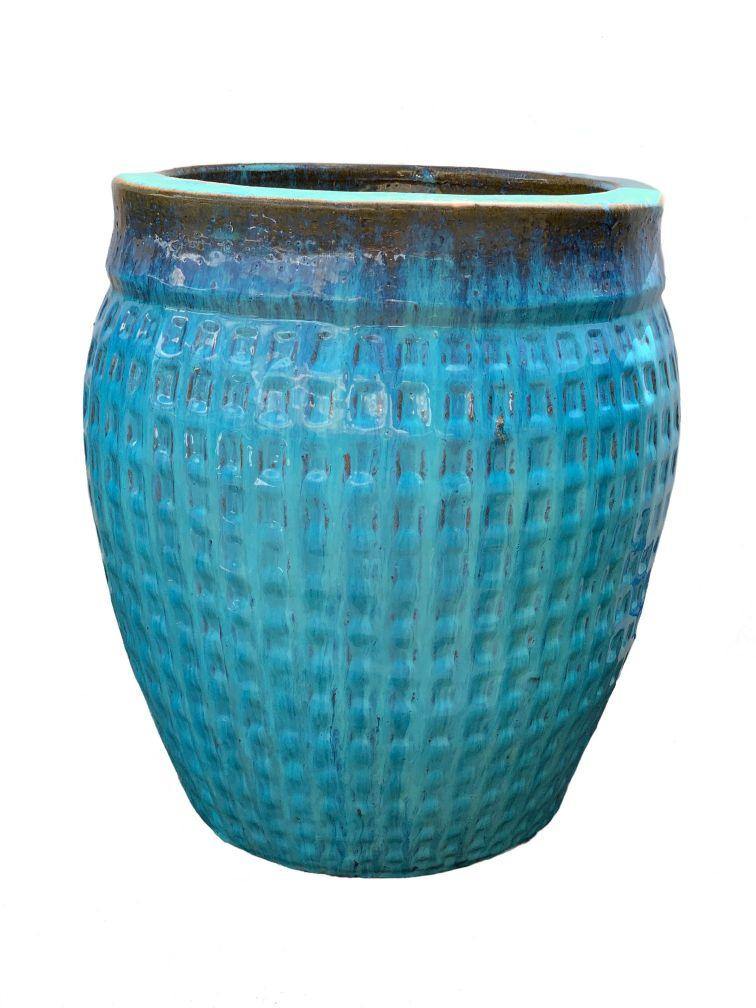 Image of a large aqua and brown waffle planter.