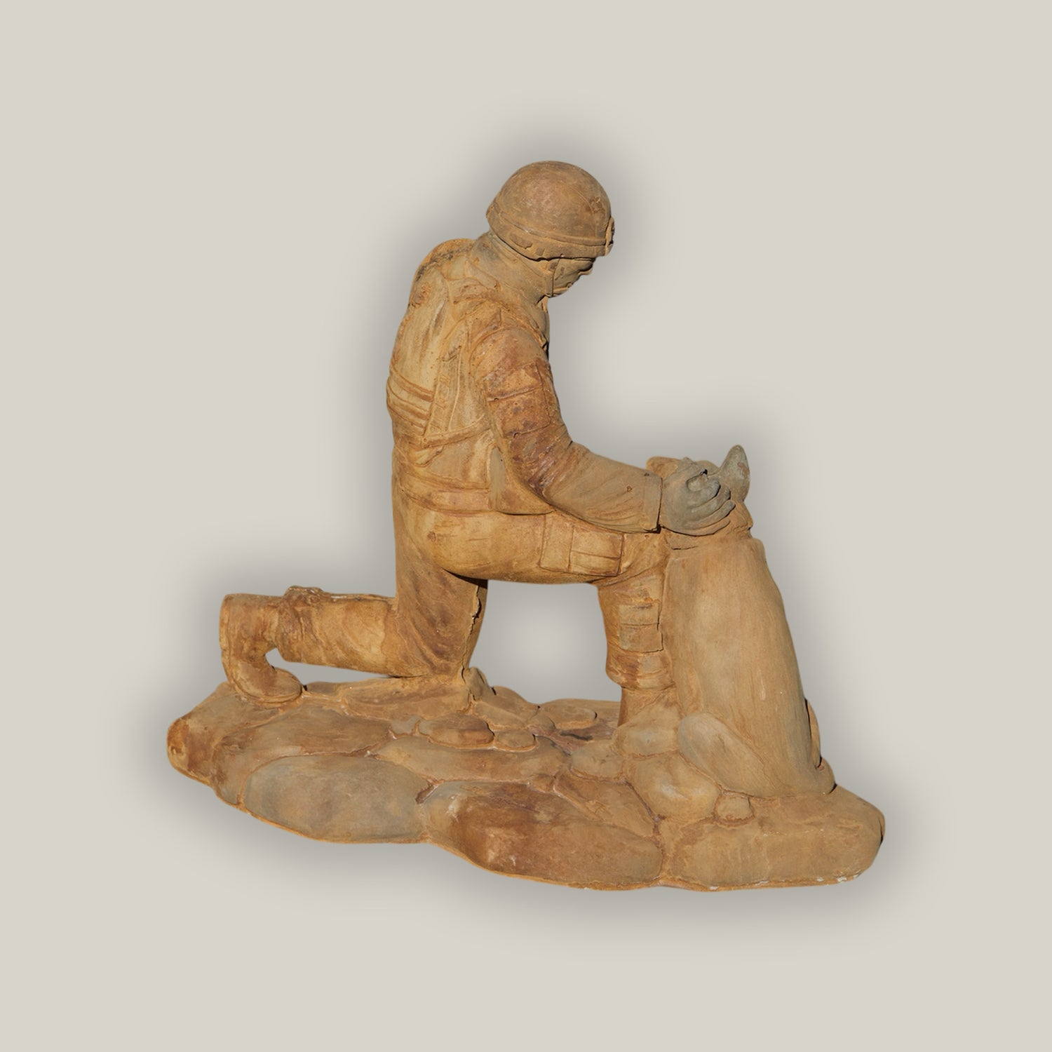 Soldier with Dog Sculpture
