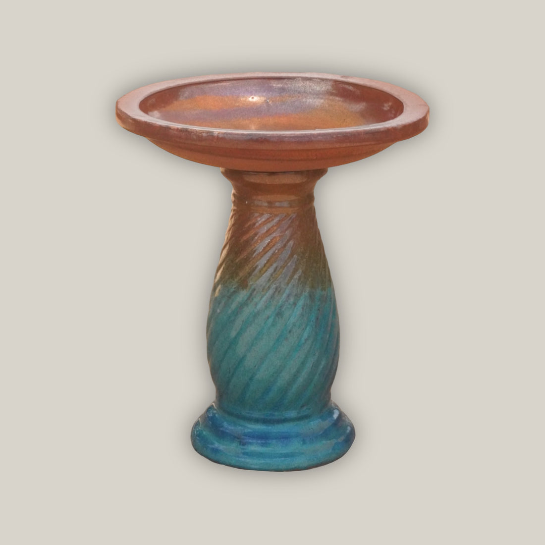 Small ornate ceramic bird bath for garden use