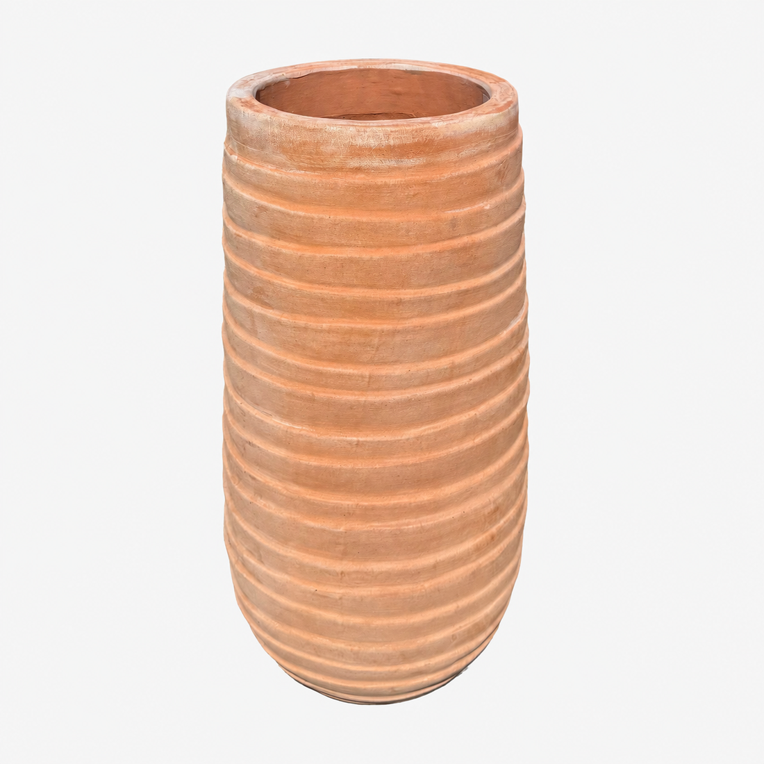 A terracotta planter with a ribbed, fluted texture, shown against a plain white background.