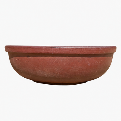 A clay planter with a wide, slightly flared rim, shown against a plain white background.