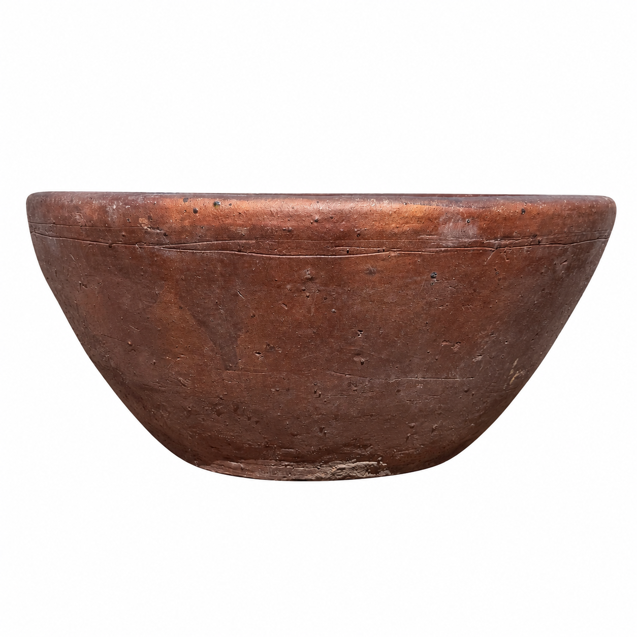 A rustic, handcrafted clay bowl with a textured, earthy brown surface, shown against a plain white background.