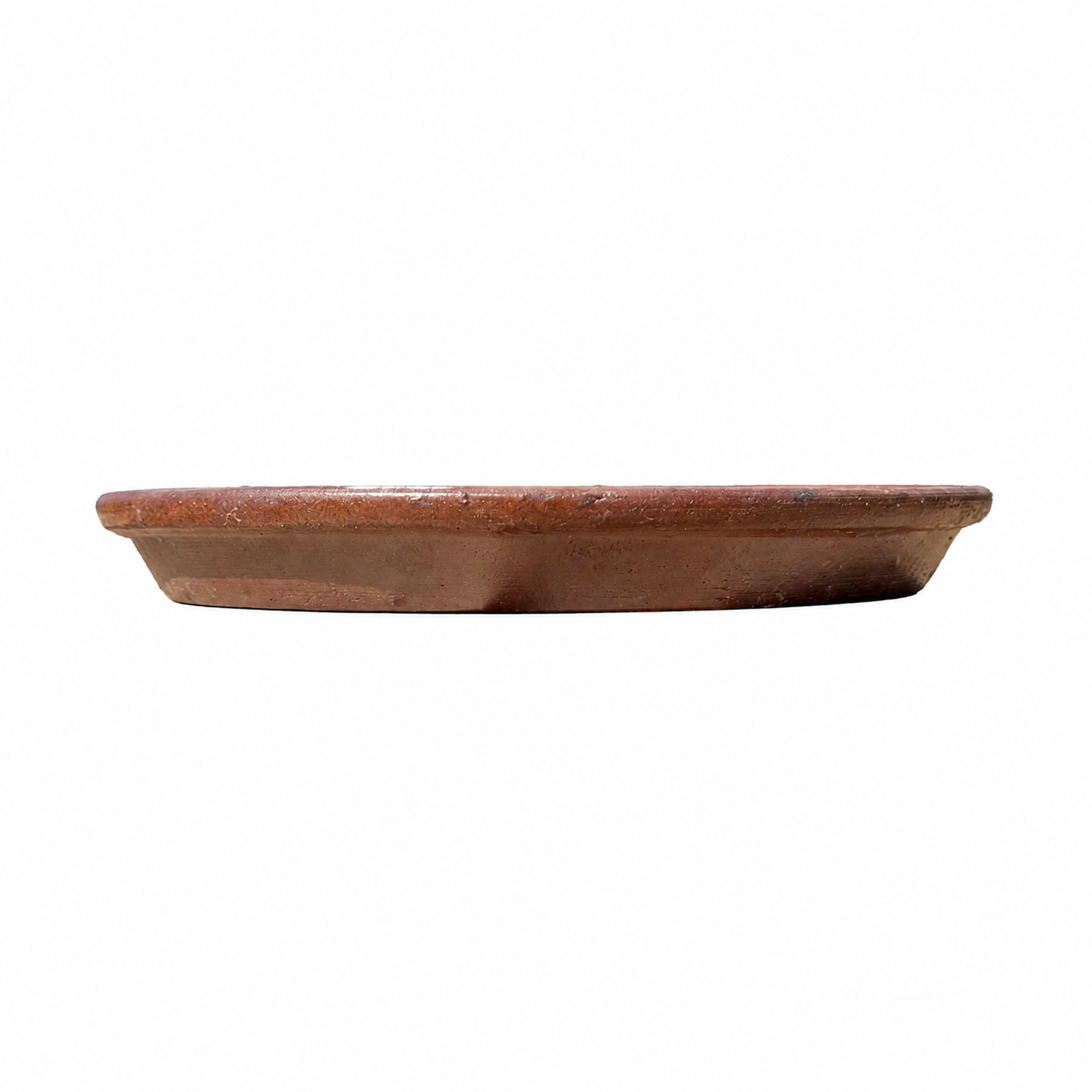 A rustic terracotta clay shallow planter with a textured, earthy brown finish, shown from a side profile view against a solid white background.