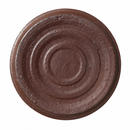 A round, dark brown ceramic plant saucer with concentric circular ridges, shown from a top-down view on a solid white background.