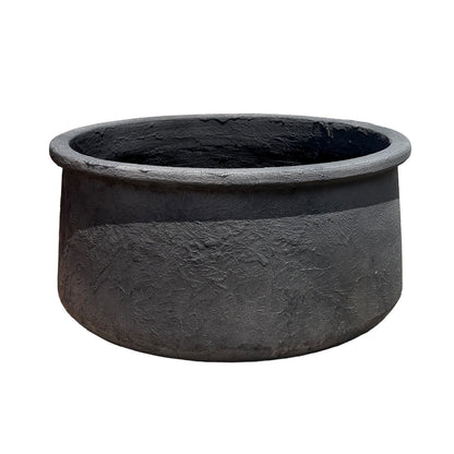 A large round planter with a textured gray finish, shown against a plain white background.