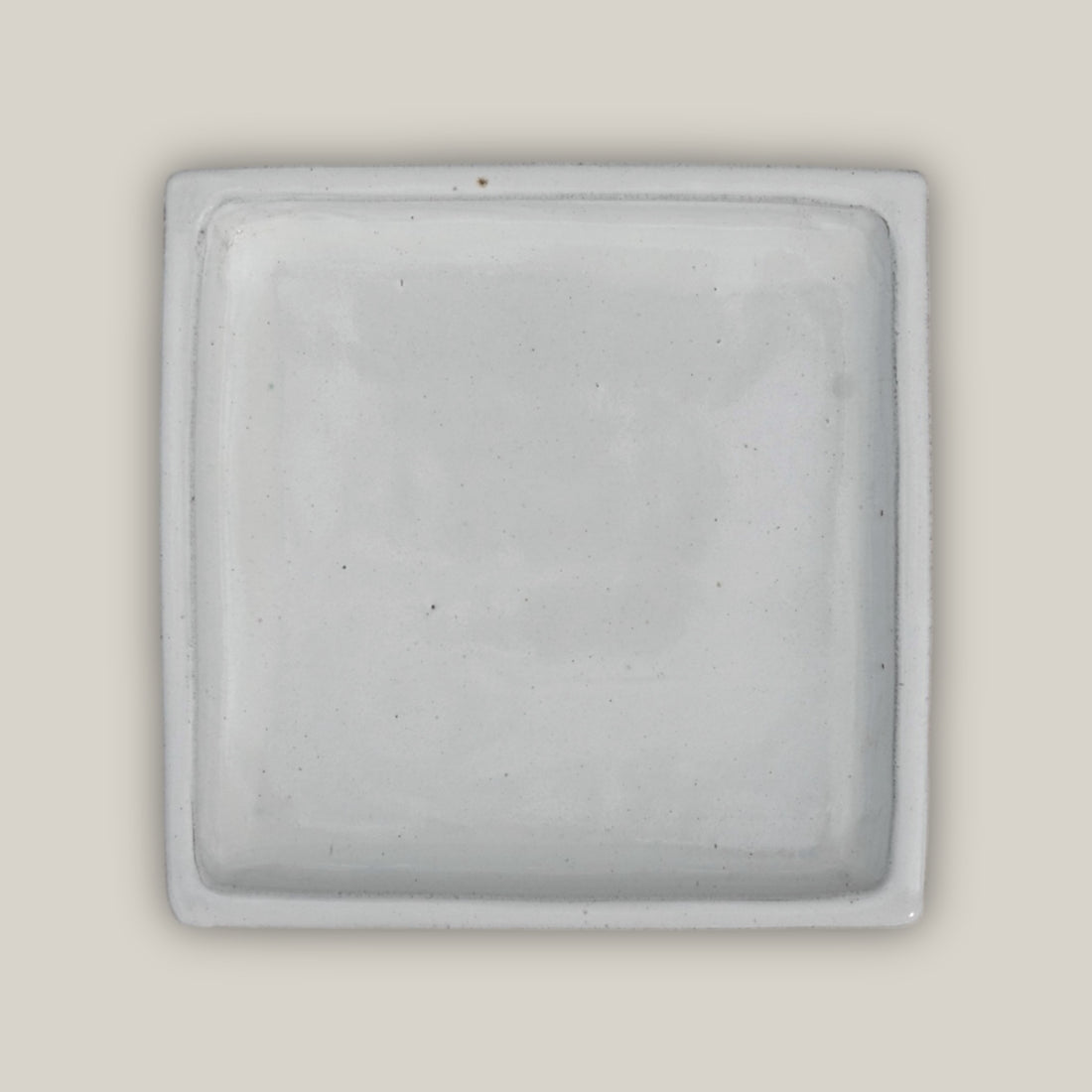 White square plant saucer made from ecofriendly ceramic
