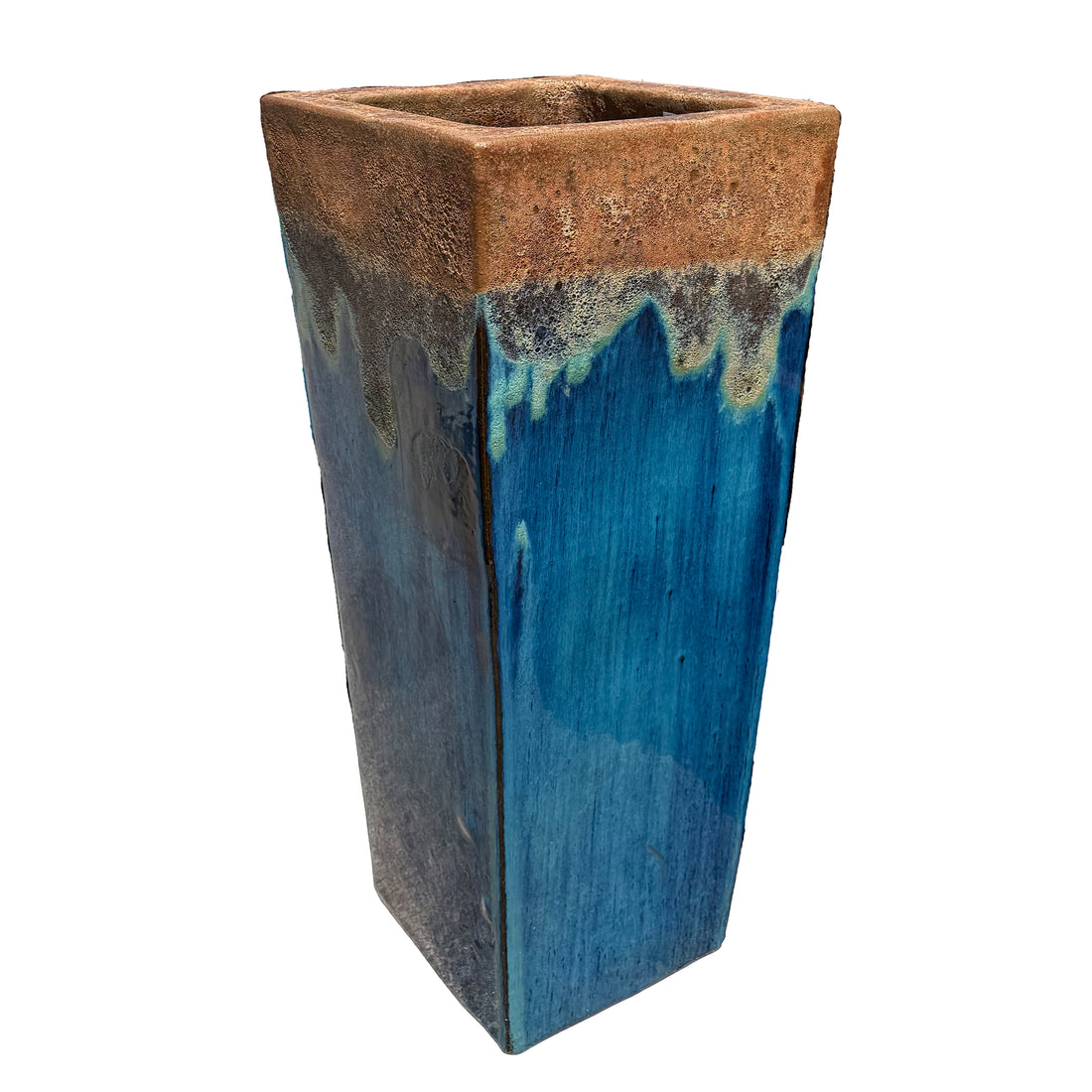 Angkor and Marble Green dragon wedge planter at an angle, with a rusty copper rim dripping into a glossy teal-blue glaze.