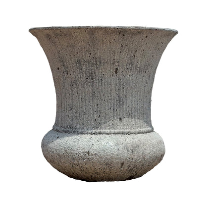 Atlantis White Fluted Urn Ceramic Planter, straight-on front view showcasing a classic urn silhouette with a flared fluted rim, ribbed vertical texture along the body, a tapered waist, and a rounded bulbous base in a softly weathered white stone finish.