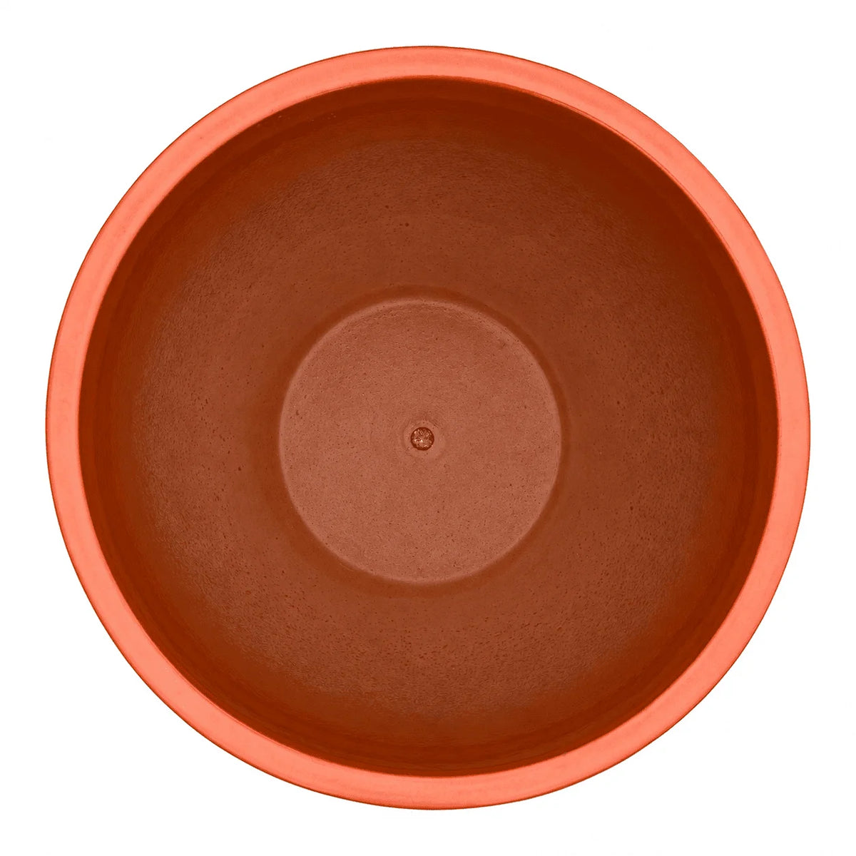 Top-down view of an atomic orange tapered round ceramic planter, with a coral-orange rim, warm orange inner walls and a raised circular floor with a small drainage hole at the center