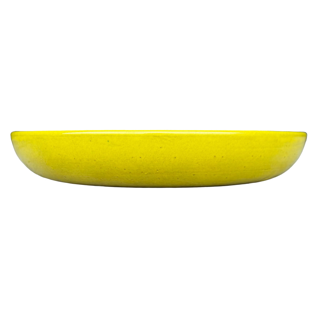 Side view of a shallow, rounded atomic yellow ceramic succulent bowl in a vivid sunny-yellow glaze with fine dark speckles