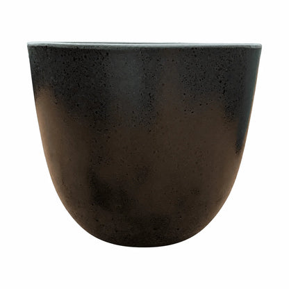 Front view of a black tapered round ceramic planter with a rounded body that narrows toward the base, finished in a dark satin glaze with a fine pitted, stone-like texture
