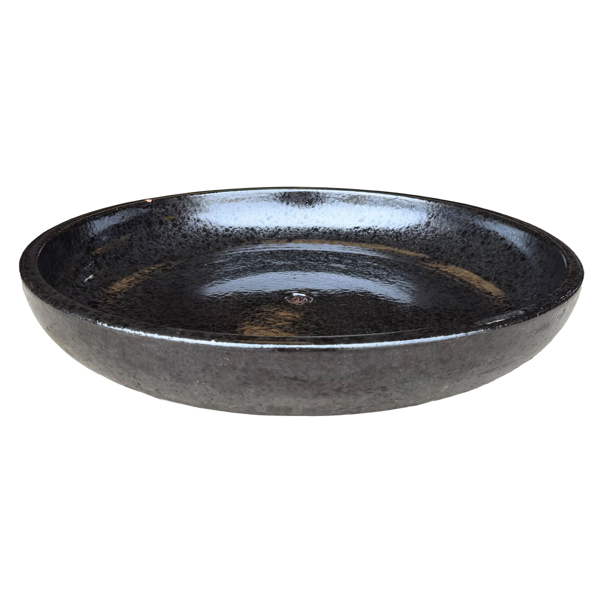 Angled view of a wide, shallow black ceramic succulent bowl, showing a high-gloss speckled black interior, a central drainage hole and a charcoal outer wall
