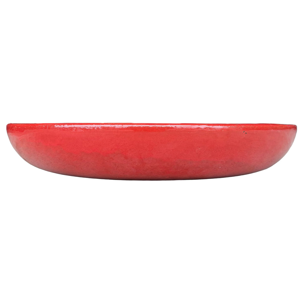 Front view of a shallow, rounded bright red ceramic succulent bowl, with a glossy rim above a softer red lower body