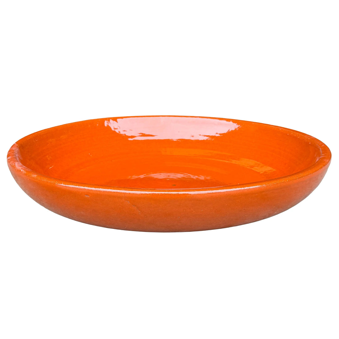 Atomic Orange ceramic bird bath bowl, slightly angled from above to show its shallow, glossy basin and smooth rounded rim.