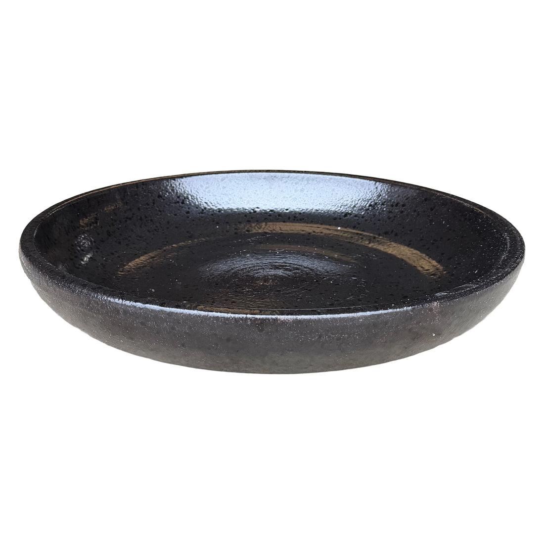 Black Tiger ceramic bird bath bowl, slightly angled from above to show its speckled, glossy basin and dark outer wall.