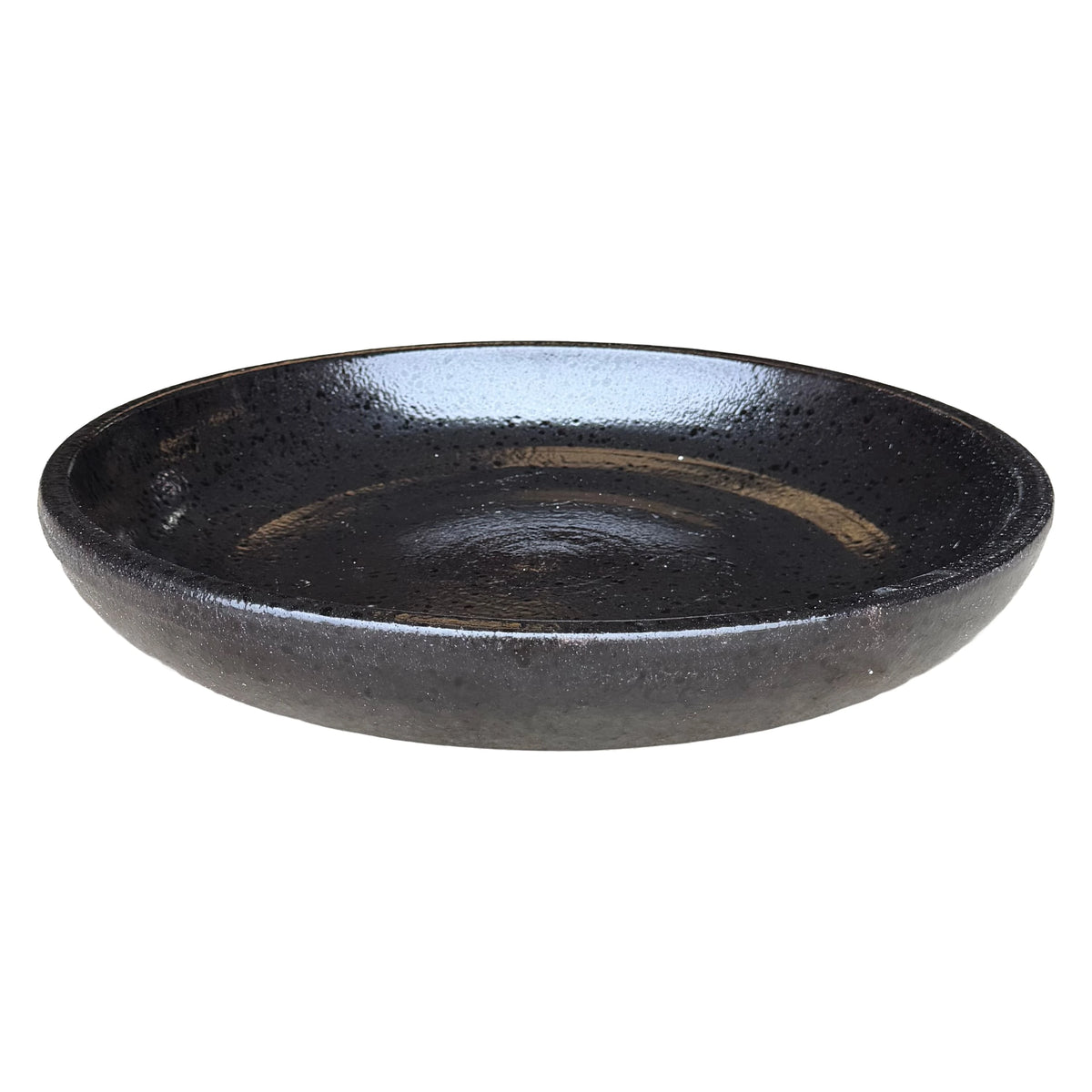 Black Tiger ceramic bird bath bowl, slightly angled from above to show its speckled, glossy basin and dark outer wall.