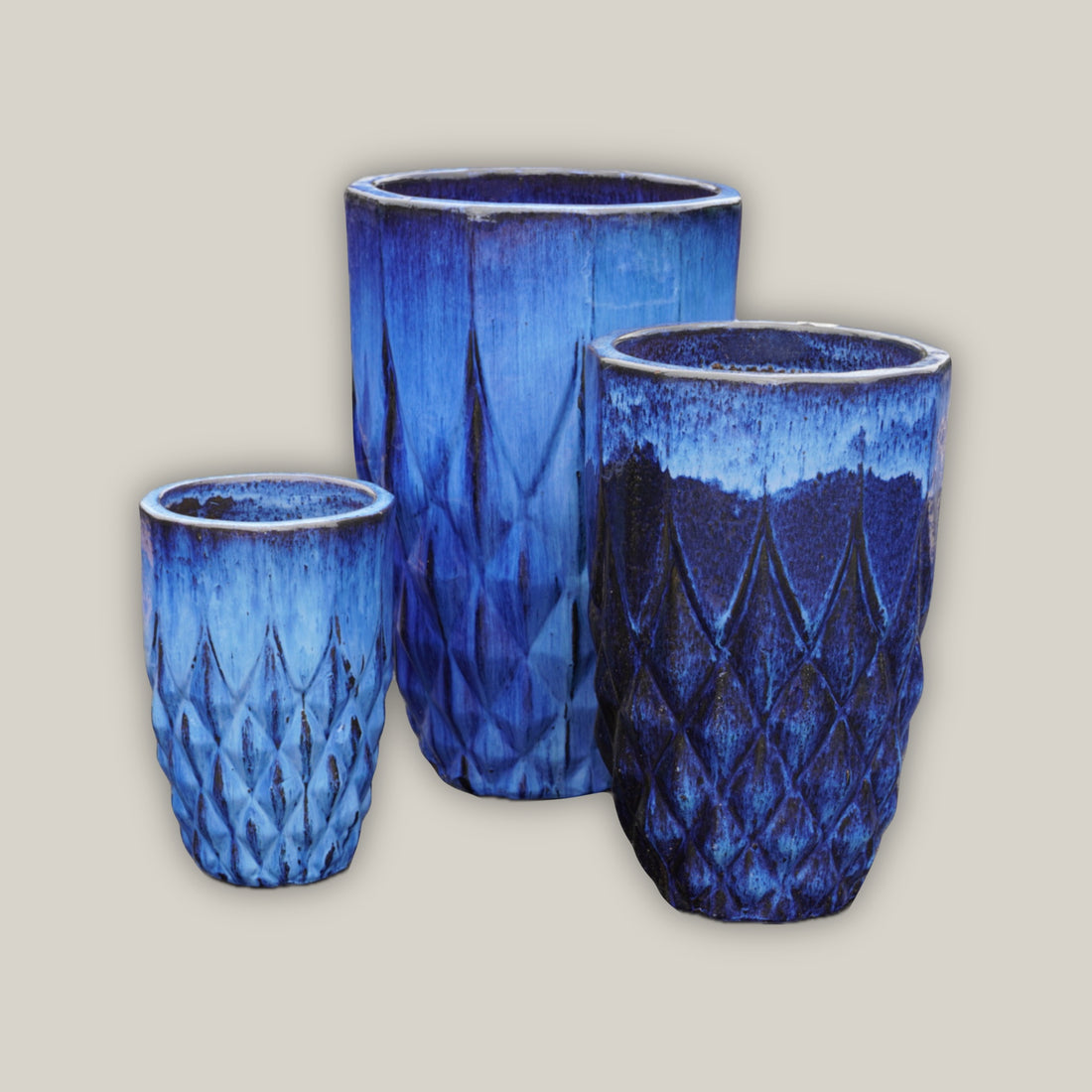 Cobalt blue round planter pot with pineapple design