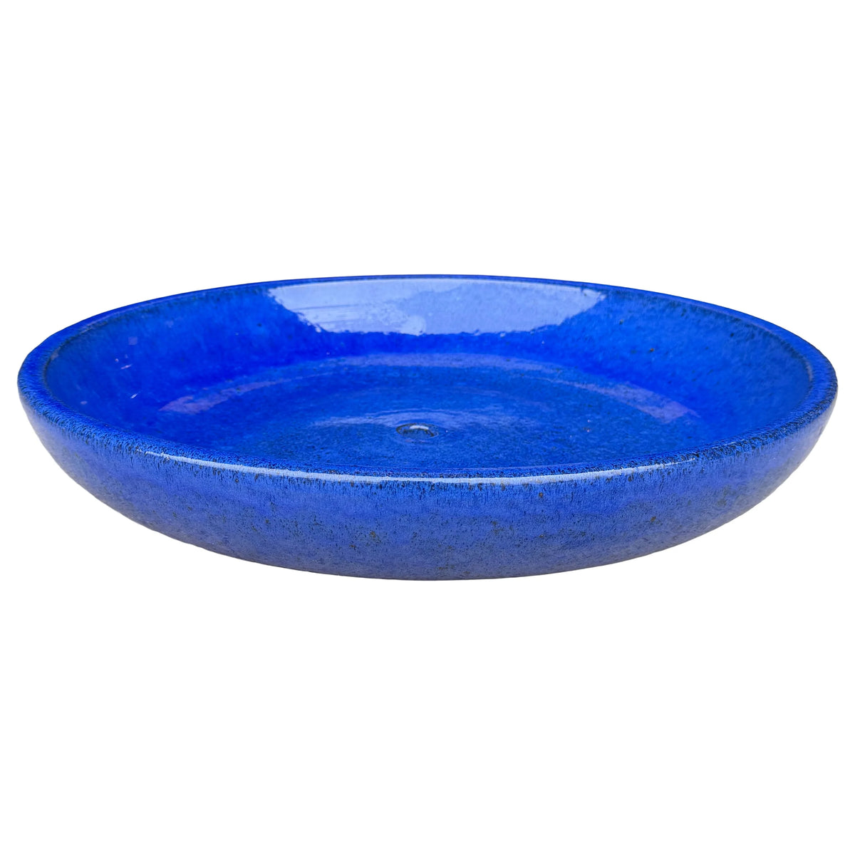 Falling Blue ceramic succulent bowl, slightly angled from above to show its shallow glossy basin, drainage hole, and speckled rim.