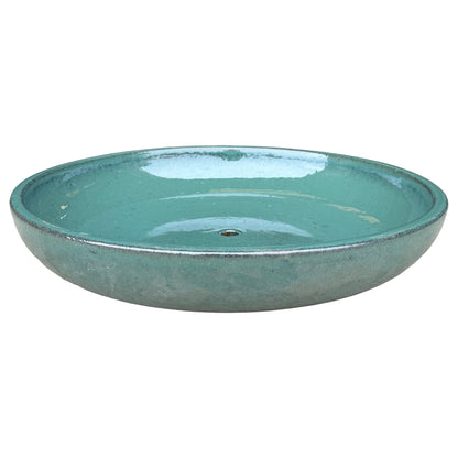 Jade ceramic succulent bowl, slightly angled from above to show its shallow glossy basin, central drainage hole, and dark-edged rim.