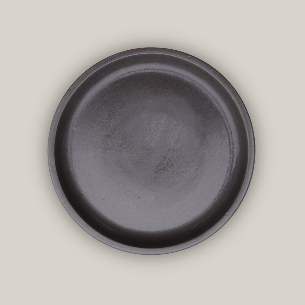 Matte Black Round Ceramic Saucer - Lion - Ten Thousand Pots - top