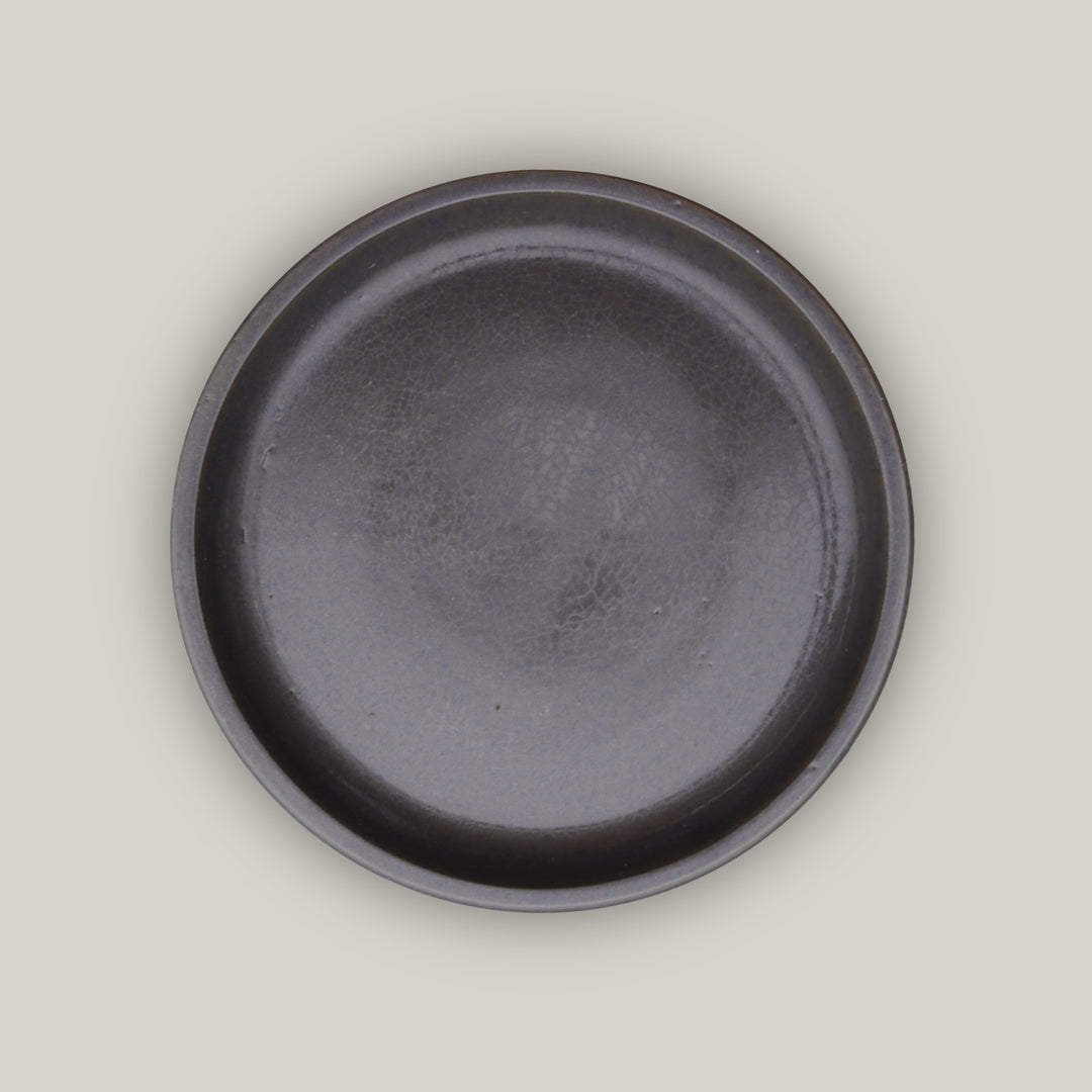 Matte Black Round Ceramic Saucer - Lion - Ten Thousand Pots - top