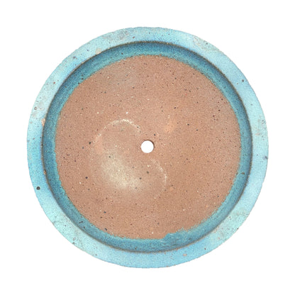 Looking straight down into the Matte Green Rustic Style Wide Bowl, its warm clay-toned basin and central drainage hole encircled by a soft matte teal-green edge