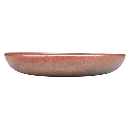 Front view of a shallow oxide ceramic succulent bowl with a rounded body and a rust-red glaze that fades to dusty tan near the base