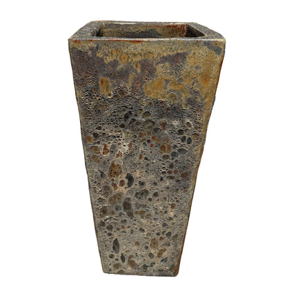 Tall square wedge planter seen from above, showing its open top and a bubbled charcoal glaze warmed by amber tones.