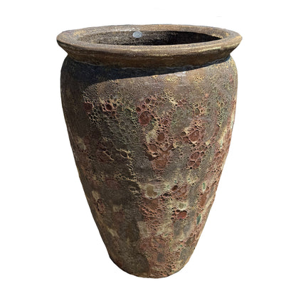 Rainforest Spring tall round tapered ceramic planter from above, with a thick bronze-toned rim and cratered earthy glaze.